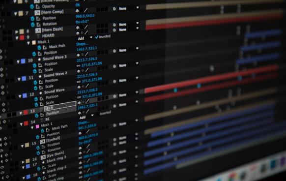 Photo of a computer screen displaying a complex Adobe After Effects project (Photo by Jacob Miller on Unsplash)